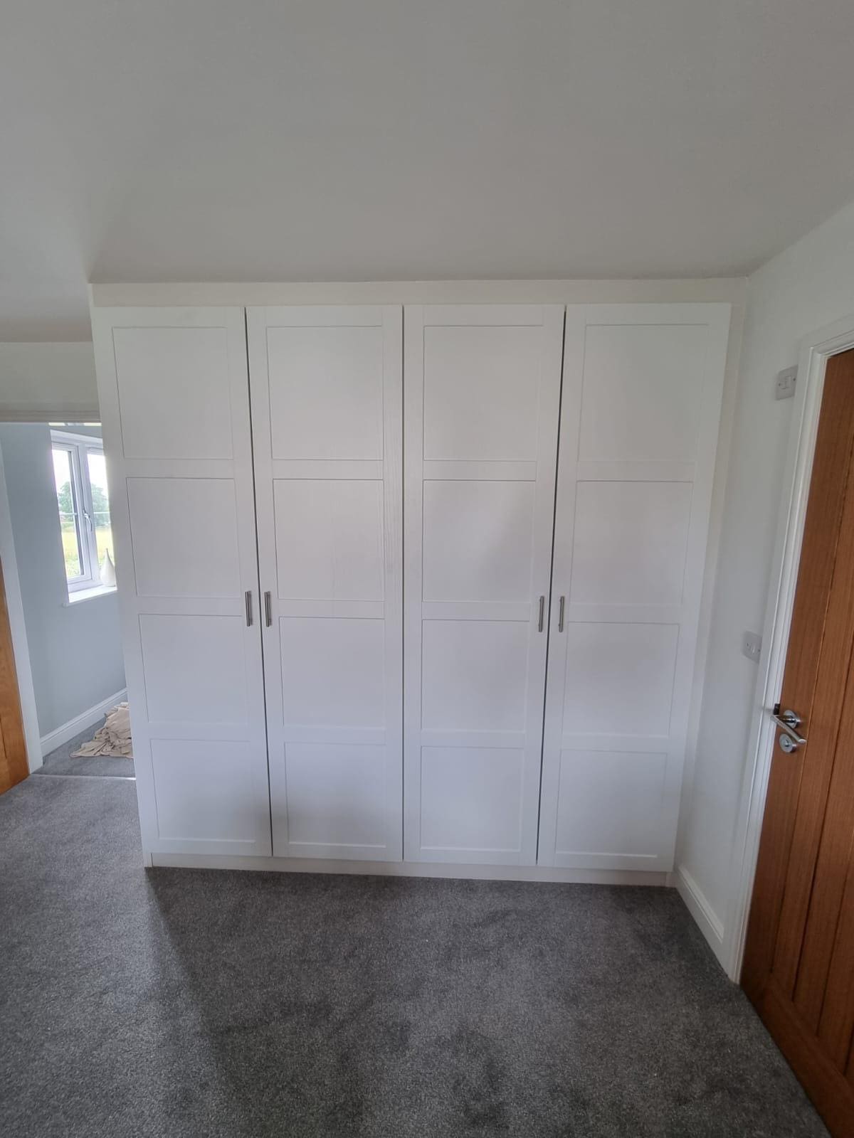 Hinged fitted wardrobe doors by glide and slide