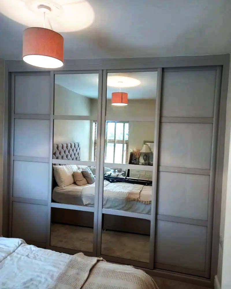 bespoke wardrobe with mirror sliding panelled doors