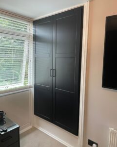 black storage cupboard