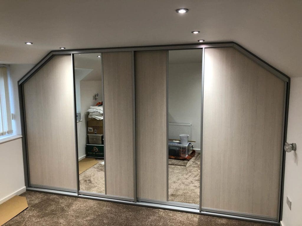 fitted wardobe awkward space with sloping ceiling